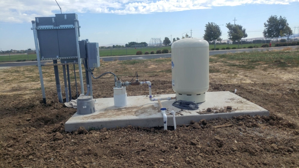 a well in the country on a slab