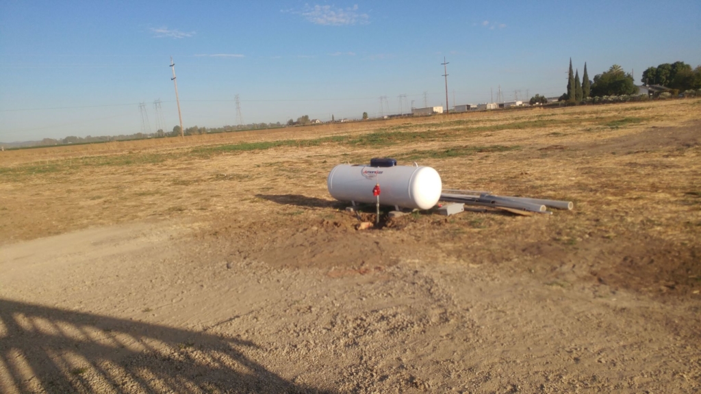 Gas shutoff next to a propane tank